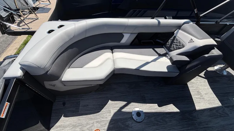 Slide: The Image of Luxurious seating on 2025 Viaggio Diamante D26U boat, featuring sleek gray upholstery and modern design. - 11
