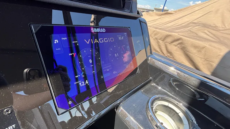 Slide: The Image of Dashboard of 2025 Viaggio Diamante D26U with Simrad display showing depth and speed. - 17