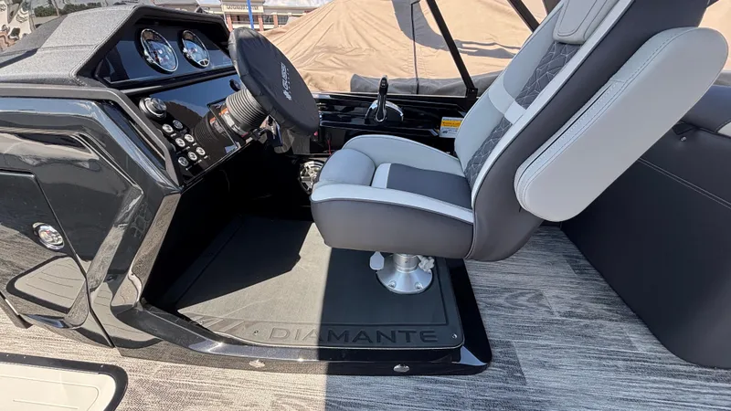 Slide: The Image of 2025 Viaggio Diamante D26U boat cockpit with modern steering and comfortable seating. - 23