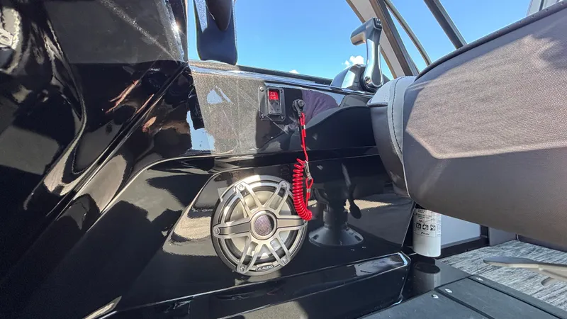 Slide: The Image of Interior of 2025 Viaggio Diamante D26U boat with speaker and control panel. - 24