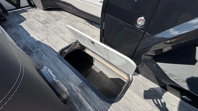 Slide: The Image of Open storage compartment in 2025 Viaggio Diamante D26U boat, featuring sleek interior design. - 25