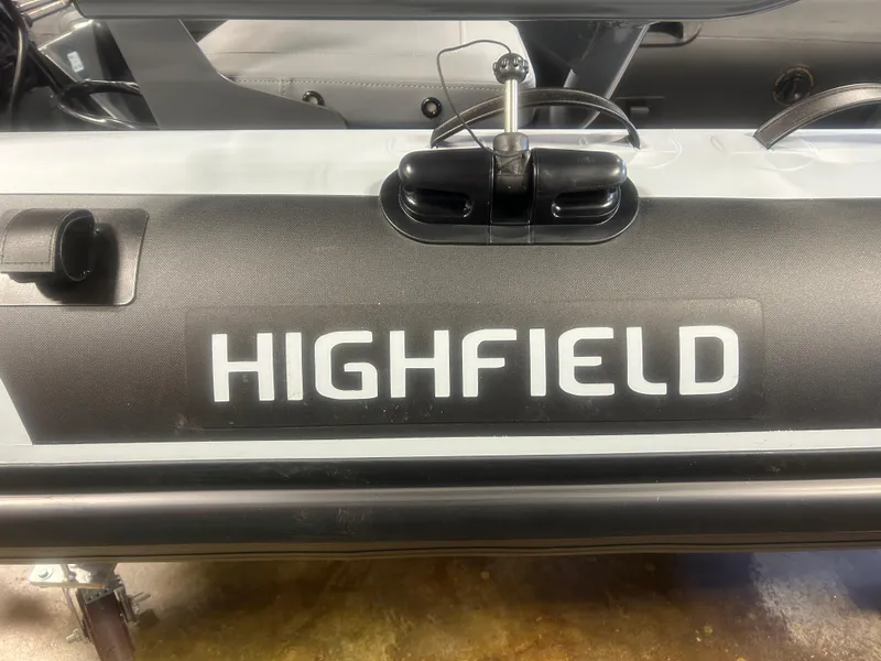 Slide: The Image of Highfield Classic 310 FCT 2025 boat, close-up of branding and design details. - 8