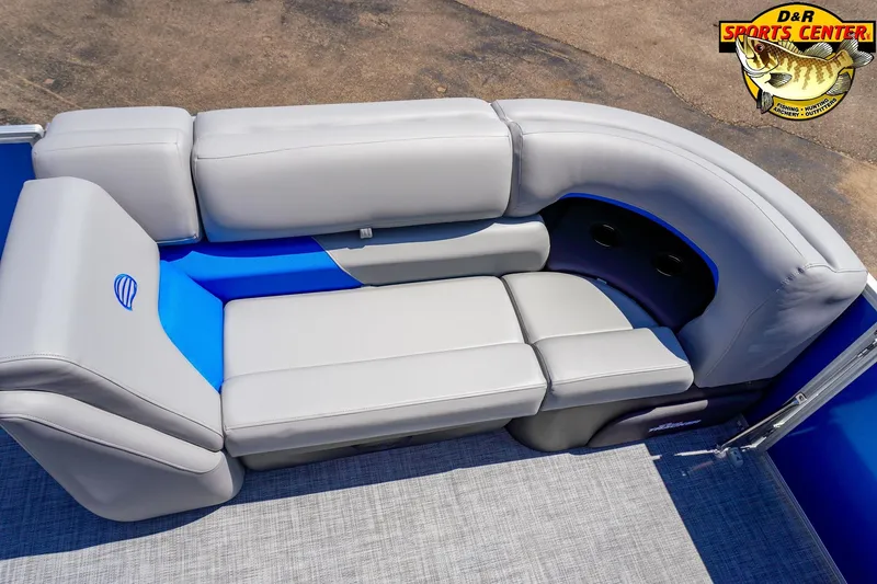 Slide: The Image of 2026 Sun Tracker Party Barge 20 DLX pontoon boat with gray and blue seating. - 6