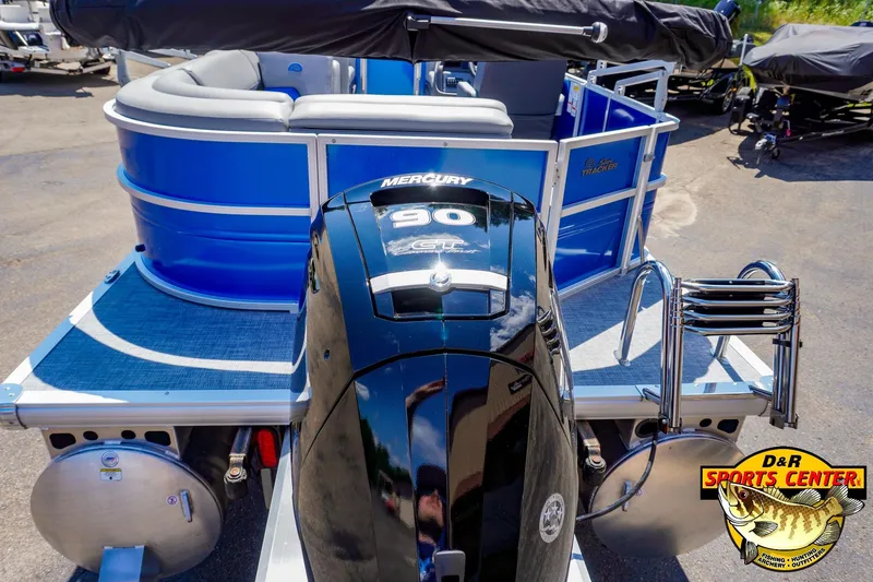 Slide: The Image of 2026 Sun Tracker Party Barge 20 DLX with Mercury 90 engine, rear view. - 9