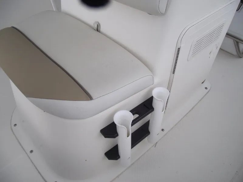 Slide: The Image of 2016 Key West 1720 Center Console boat seat with rod holders. - 14