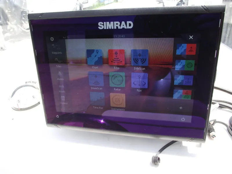 Slide: The Image of Simrad marine display on 2016 Key West 1720 Center Console boat dashboard. - 19