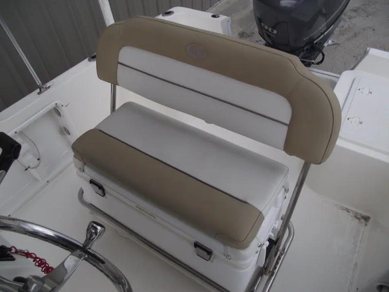 Slide: The Image of 2016 Key West 1720 Center Console boat seat and steering wheel detail. - 20