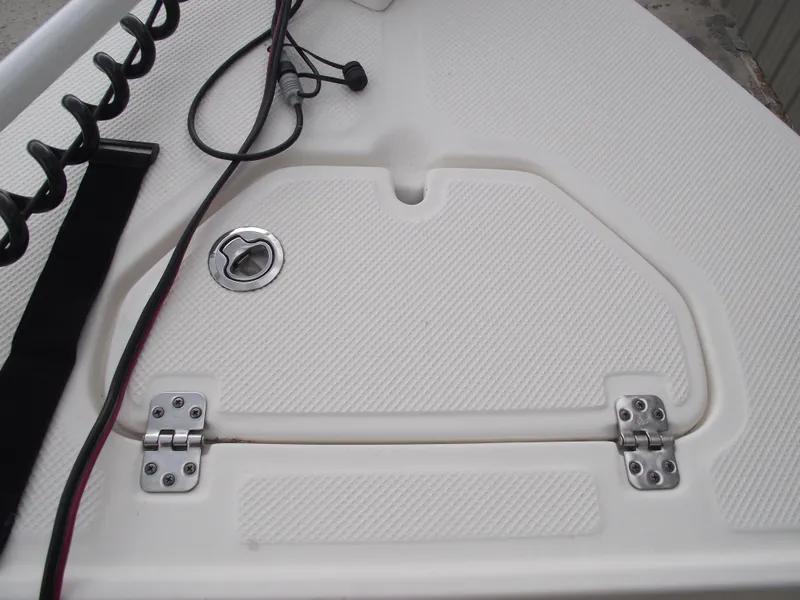 Slide: The Image of 2016 Key West 1720 Center Console boat deck with hatch and wiring. - 8