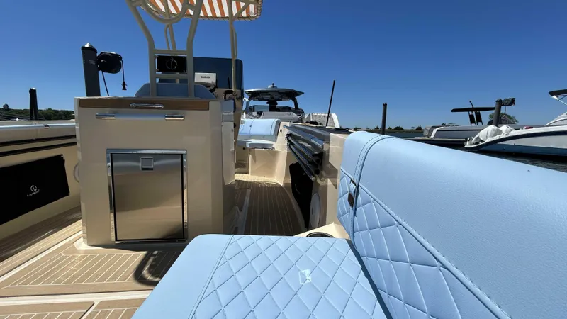 Slide: The Image of Interior of 2025 Lilybaeum Levenzo boat with light blue seating and modern amenities. - 15