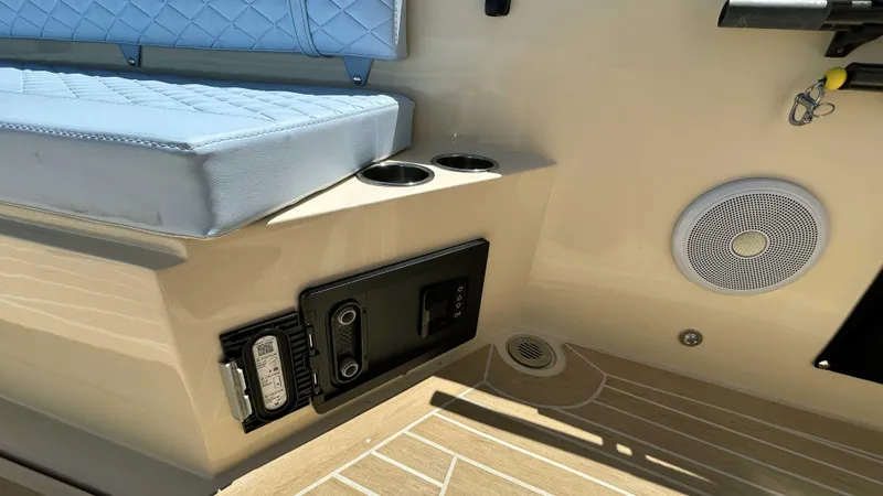 Slide: The Image of Interior of 2025 Lilybaeum Levenzo boat with blue seating and speaker system. - 19