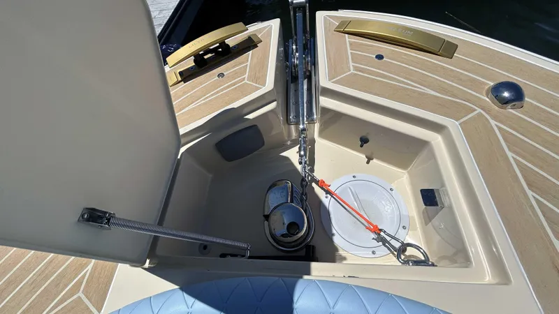 Slide: The Image of Anchor compartment of 2025 Lilybaeum Levenzo boat with chain and winch. - 24