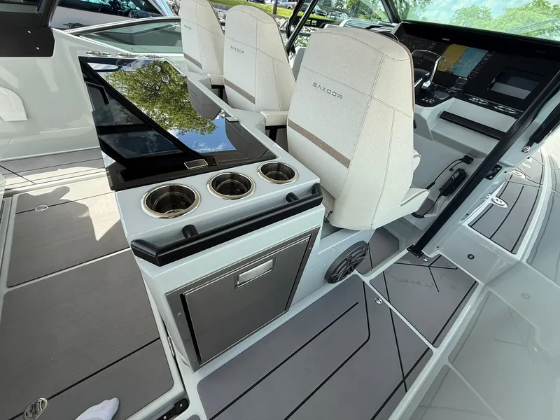 Slide: The Image of 2024 Saxdor 320 GTO interior with modern seating and sleek console design. - 10