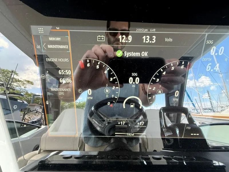 Slide: The Image of Dashboard of 2024 Saxdor 320 GTO showing engine hours and system status. - 17
