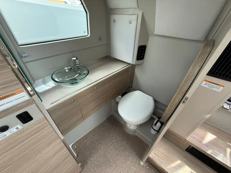 Slide: The Image of 2024 Saxdor 320 GTO bathroom with modern sink and toilet, featuring sleek design. - 23