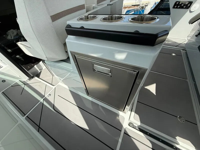 Slide: The Image of 2024 Saxdor 320 GTO interior with modern seating and built-in cup holders. - 9