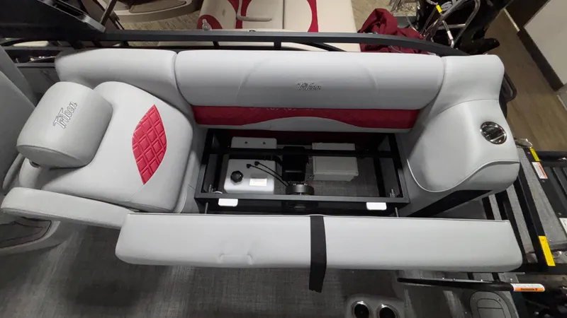 Slide: The Image of Interior view of 2025 JC Neptoon 25TT Sport pontoon boat with open storage compartment. - 12