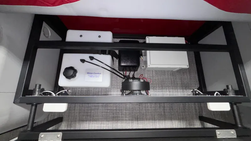 Slide: The Image of Under-seat storage of 2025 JC Neptoon 25TT Sport with Mister-Comfort system components. - 13