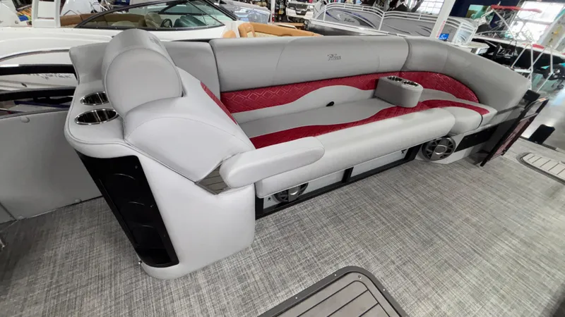 Slide: The Image of Luxurious seating on 2025 JC Neptoon 25TT Sport pontoon boat with cup holders and stylish design. - 20