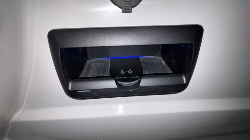 Slide: The Image of Wireless charging station on JC Neptoon 25TT Sport 2025 boat. - 25