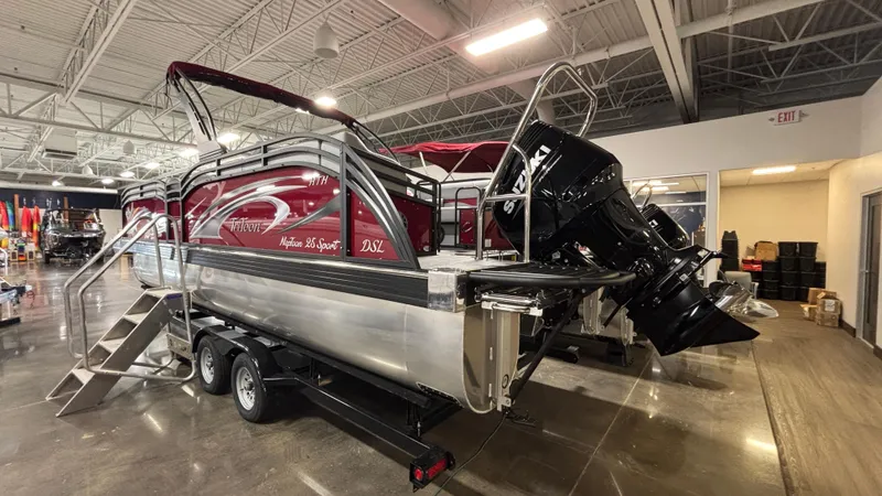 Slide: The Image of 2025 JC Neptoon 25TT Sport pontoon boat with Suzuki outboard motor in showroom. - 33
