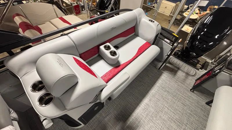 Slide: The Image of Interior of 2025 JC Neptoon 25TT Sport boat with red and gray seating. - 6
