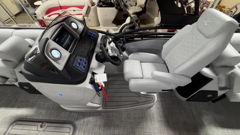 Slide: The Image of 2025 JC Neptoon 25TT Sport boat interior with modern dashboard and comfortable seating. - 14