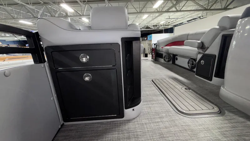 Slide: The Image of 2025 JC Neptoon 25TT Sport interior with sleek seating and storage compartments. - 18