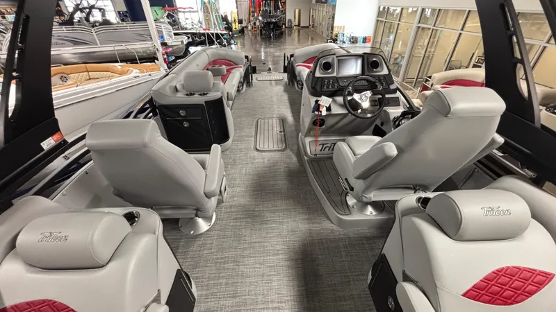 Slide: The Image of Interior of 2025 JC Neptoon 25TT Sport pontoon boat with luxurious seating and modern dashboard. - 9