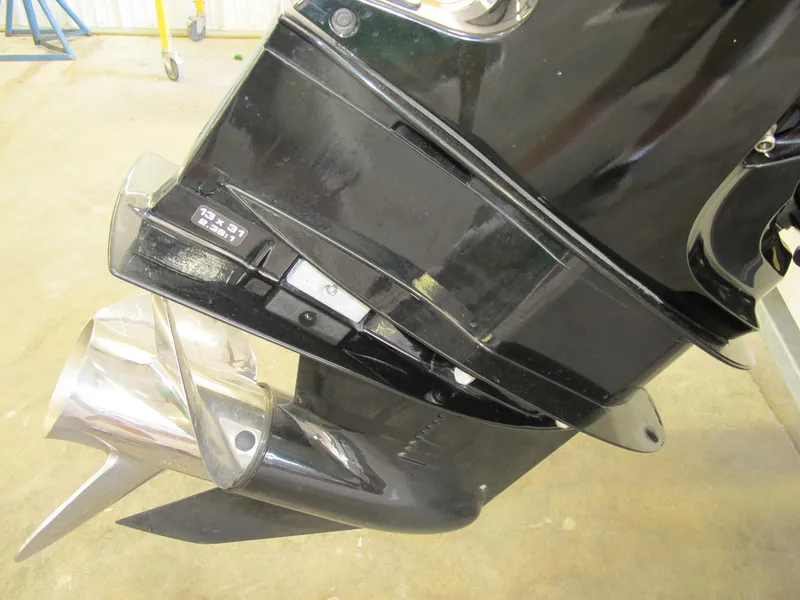 Slide: The Image of Close-up of a 2018 Boston Whaler 170 Montauk boat motor and propeller. - 10