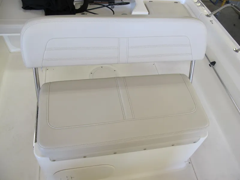 Slide: The Image of 2018 Boston Whaler 170 Montauk boat seat, white upholstery, stainless steel frame. - 6