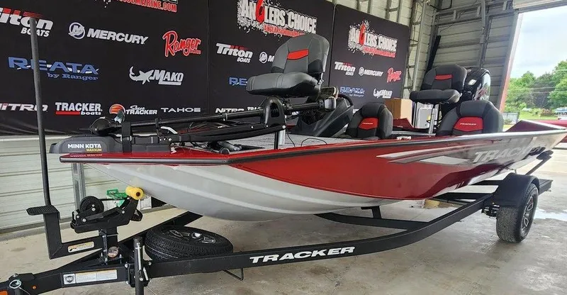 Slide: The Image of 2025 Tracker Pro Team™ 195 Tournament Edition boat on trailer in showroom. - 3