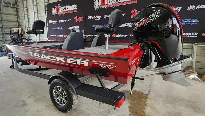 Slide: The Image of 2025 Tracker Pro Team 195 Tournament Edition boat on display in a showroom. - 5