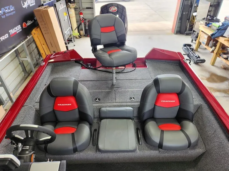 Slide: The Image of 2025 Tracker Pro Team™ 195 Tournament Edition boat interior with red and gray seating. - 6