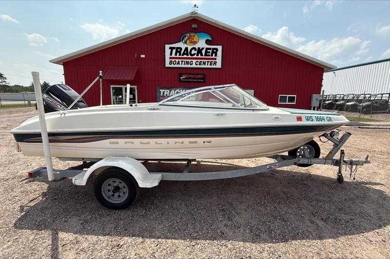 Slide: The Image of 1999 Bayliner 1800 Capri boat on trailer at Tracker Boating Center. - 0