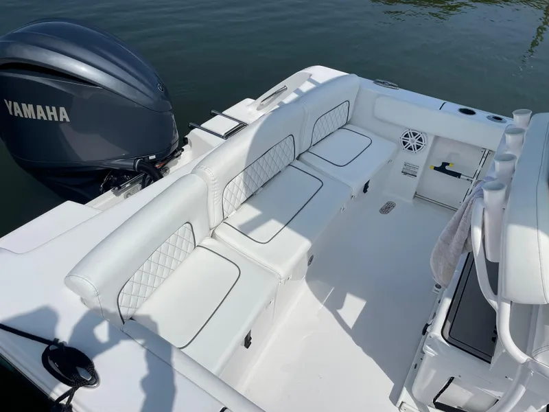 Slide: The Image of 2023 Sportsman Heritage 231 Center Console boat with Yamaha engine, featuring spacious seating. - 5
