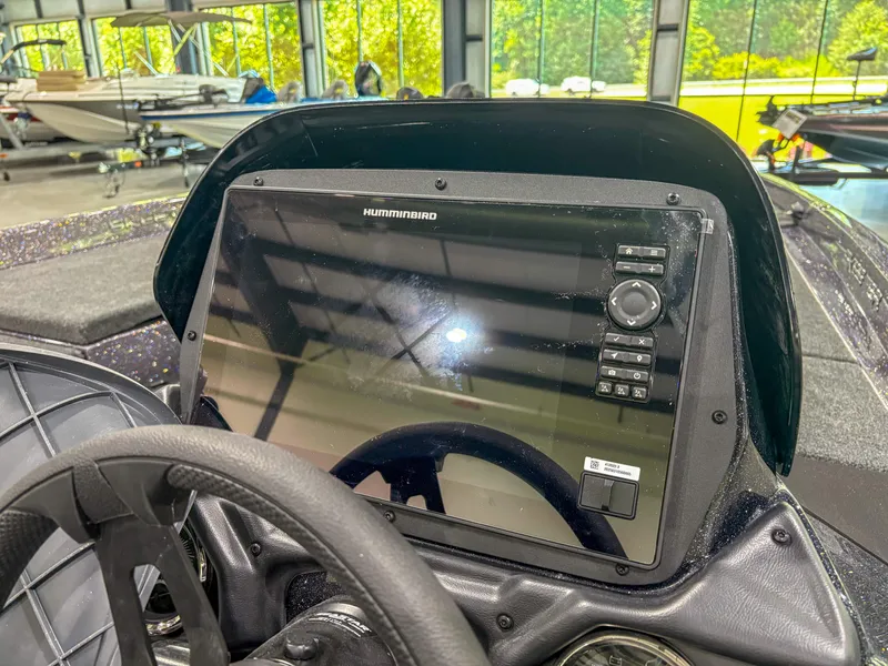 Slide: The Image of 2025 Skeeter ZXR 21 SE boat dashboard with Humminbird navigation system. - 10