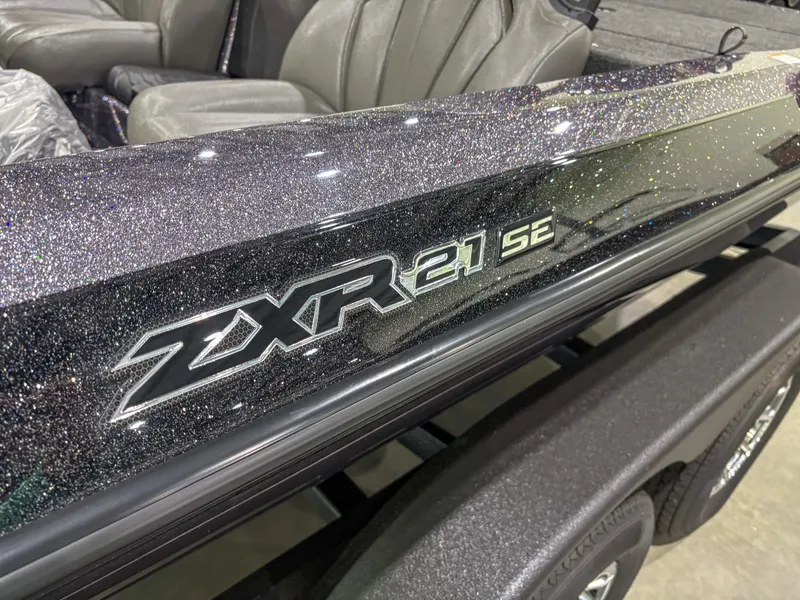 Slide: The Image of 2025 Skeeter ZXR 21 SE boat with glittery finish and sleek design. - 8