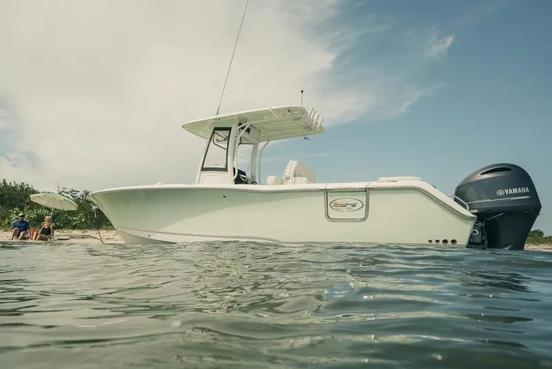 Slide: The Image of 2019 Sea Hunt Ultra 275 SE boat with Yamaha engine on trailer. - 2