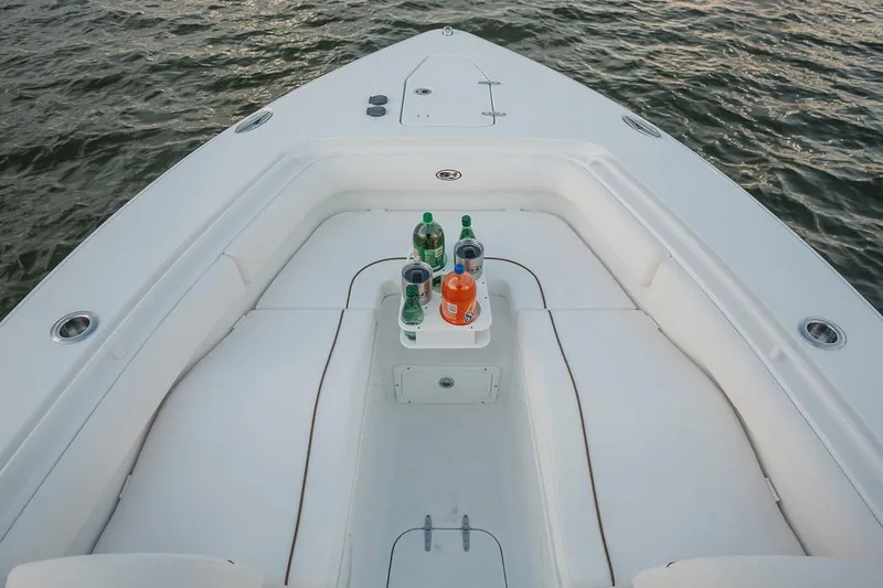 Slide: The Image of 2019 Sea Hunt Ultra 275 SE boat with dual Yamaha engines on a trailer. - 3