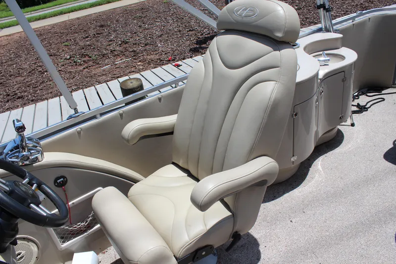 Slide: The Image of Luxurious seating on 2011 Harris FloteBote 250 Royal Heritage pontoon boat. - 13
