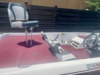 Slide: The Image of 1999 G3 Pro G185 boat with red interior and elevated seating. - 5