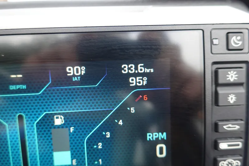 Slide: The Image of Dashboard display of 2023 Axis T250 showing temperature, hours, and RPM. - 14