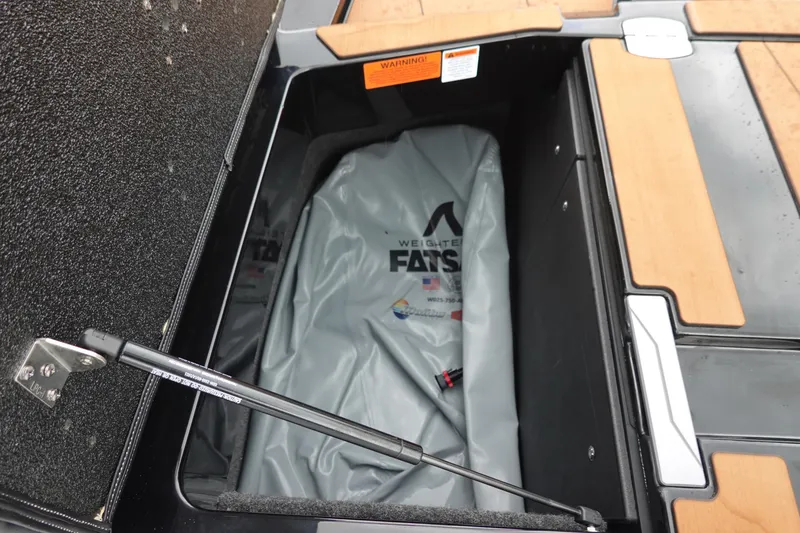 Slide: The Image of 2023 Axis T250 boat storage compartment with weighted fatsac and hydraulic lift. - 32