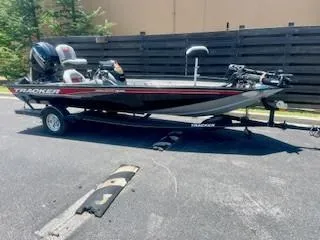 Slide: The Image of 2017 Tracker Pro Team 195 TXW boat on trailer, parked outdoors. - 6