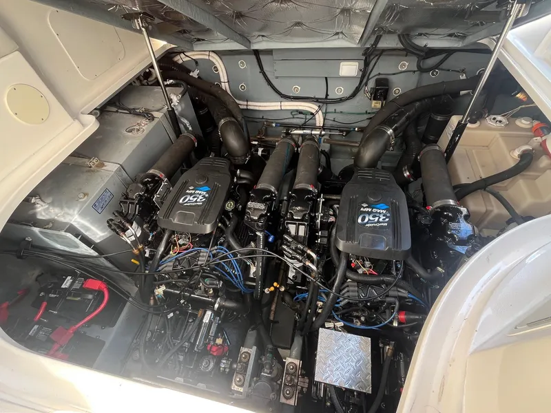 Slide: The Image of Engine compartment of a 2002 Sea Ray 320 Sundancer with twin MerCruiser 350 engines. - 36