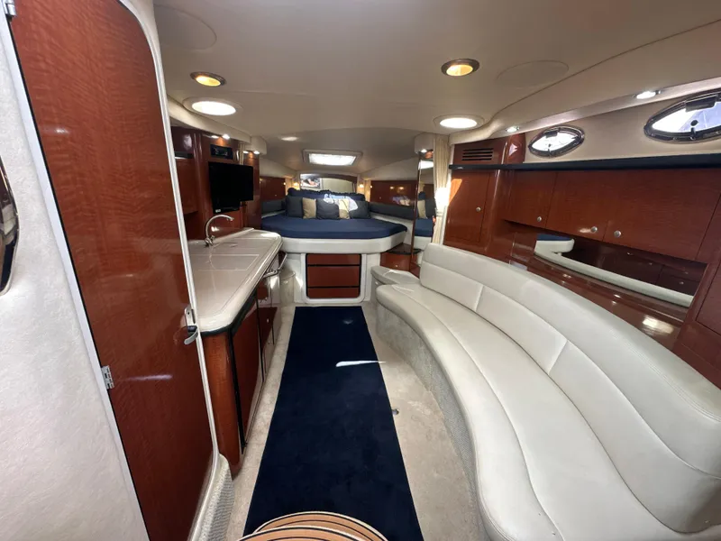 Slide: The Image of Luxurious interior of 2005 Sea Ray 340 Sundancer yacht with elegant seating and modern amenities. - 45