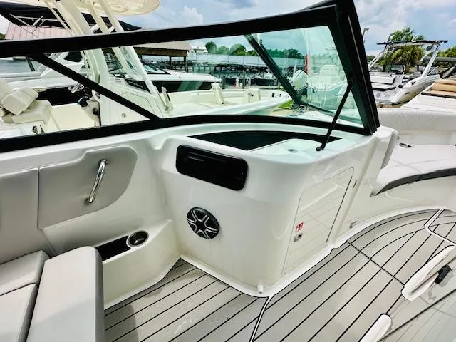 Slide: The Image of 2026 Sea Ray SDX 250 Outboard interior with sleek design and modern features. - 14