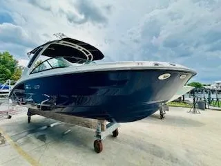 Slide: The Image of 2026 Sea Ray SDX 250 Outboard boat on display, showcasing sleek design and modern features. - 5