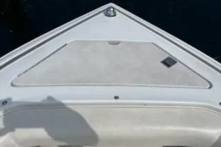 Slide: The Image of Bow of a 1999 Cobalt 226 boat with clean white deck. - 21