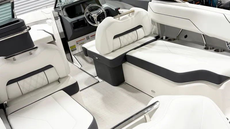Slide: The Image of 2025 Regal LX4 boat interior with luxurious white seating and modern design. - 6